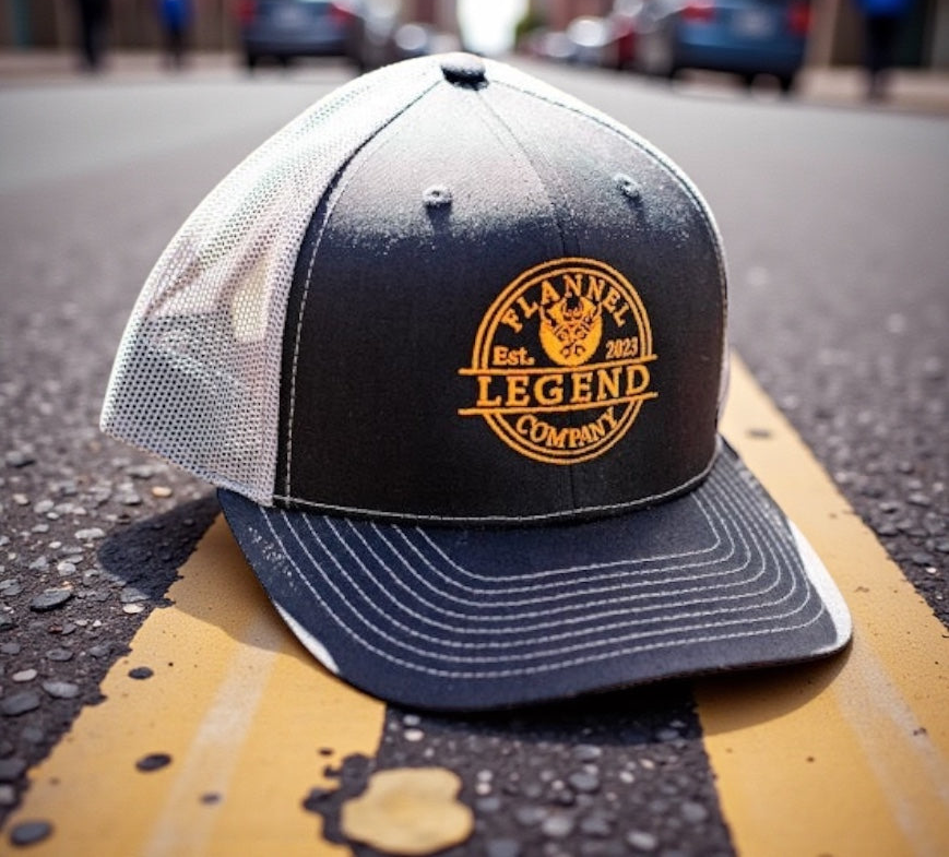 LEGEND ORANGE LOGO TWO TONE BLACK WITH GREY MESH SNAP BACK CURVED BILL TRUCKER HAT