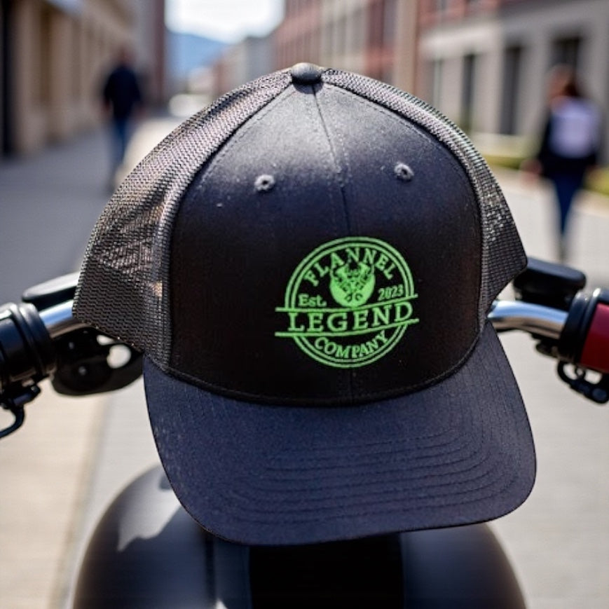 LEGEND BLACK WITH GREEN LOGO CURVED BILL  SNAP BACK TRUCKER HAT