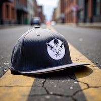 LEGEND BLACK WITH WHITE PISTON LOGO FLAT BILL FLEX FIT TRUCKER HAT