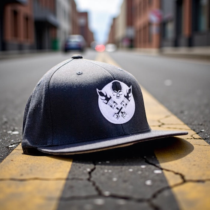 LEGEND BLACK WITH WHITE PISTON LOGO FLAT BILL FLEX FIT TRUCKER HAT