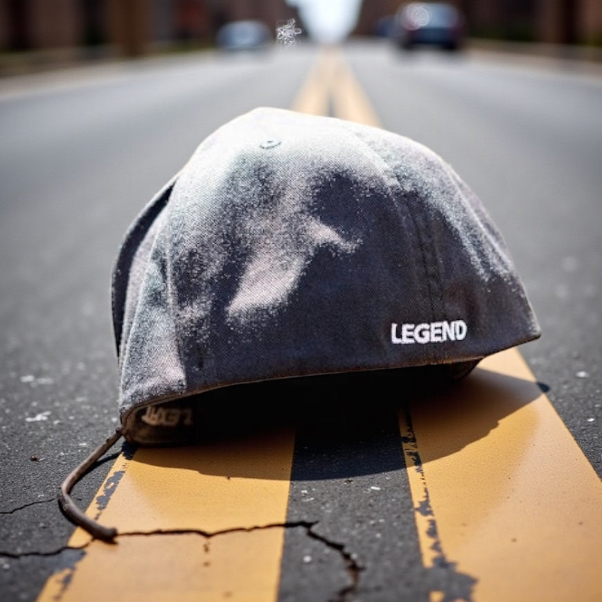 LEGEND BLACK WITH WHITE PISTON LOGO FLAT BILL FLEX FIT TRUCKER HAT